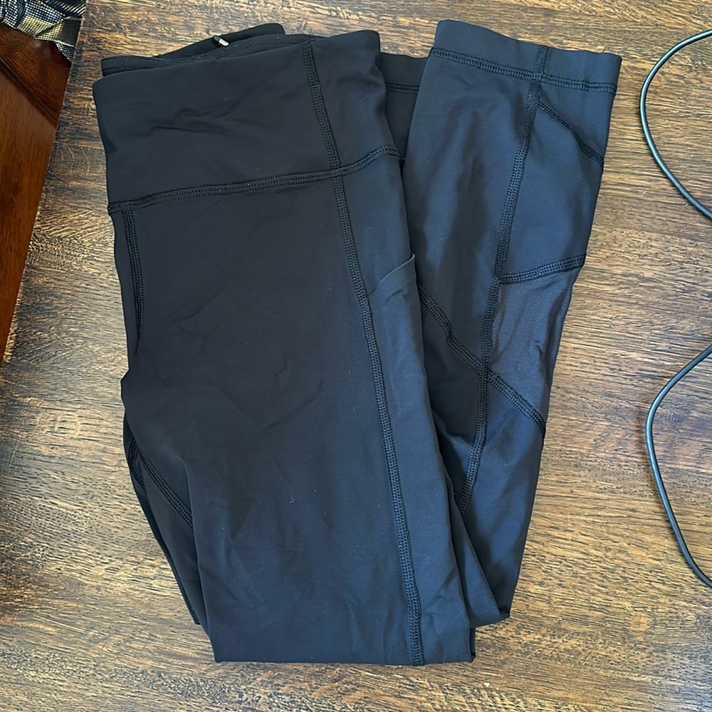 Lululemon Black 25” leggings with back zipper pocket and side pockets